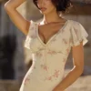 Amina elfenbensfarget maxi-te-kjol i georgette med vintage rose-mønster