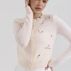 Anjou kremfarget cardigan i lammeull med rosebroderi