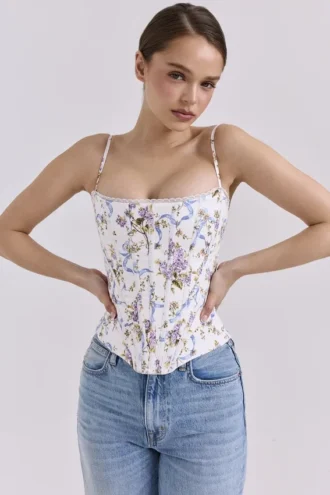 Cadie hvit korsetter-top i bomull med blomster- og båndmønster