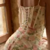 Calista ferskenfarget maxi-kjol i mesh med blomstertrykk