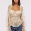 Cara Vintage Ivory Langermet Peplum-topper i blonder