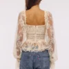 Cara Vintage Ivory Langermet Peplum-topper i blonder
