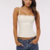 Chloe hvit bomullstop med broderie anglais-blonder