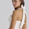 Cosette hvit broderie anglais + bomullsminikjole med halterneck