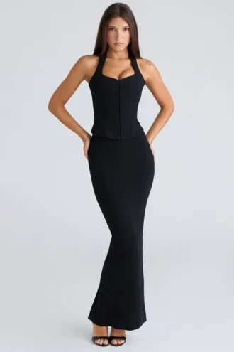 Det svarte bodycon-skjørtet med paneler