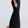 Det svarte bodycon-skjørtet med paneler