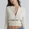 Mistle-Bow kremfarget jacquard-ullCardigan