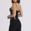 Noella svart latexkorsett-topper – begrenset utgave