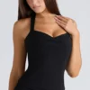 Peekaboo svart halterneck-korsetter