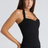Peekaboo svart halterneck-korsetter