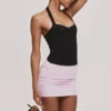 Peekaboo svart halterneck-korsetter