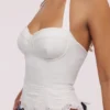 Zizi hvit halterneck-korsetter-topper med broderie anglaise