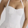 Zizi hvit halterneck-korsetter-topper med broderie anglaise