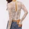 Zoe Vintage elfenbensfarget langermet korsetter-top i blonder